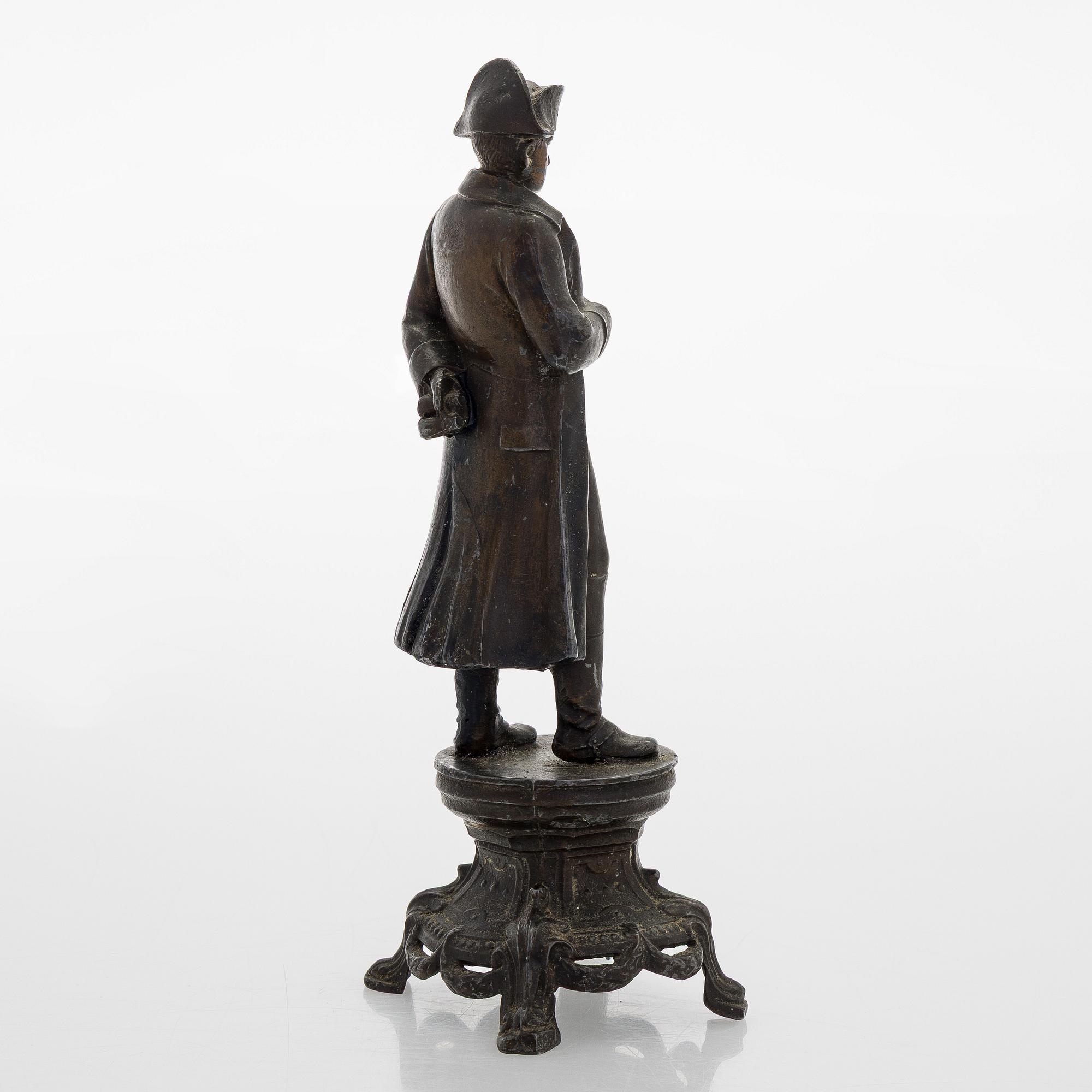A 20th century patinated white metal sculpture.