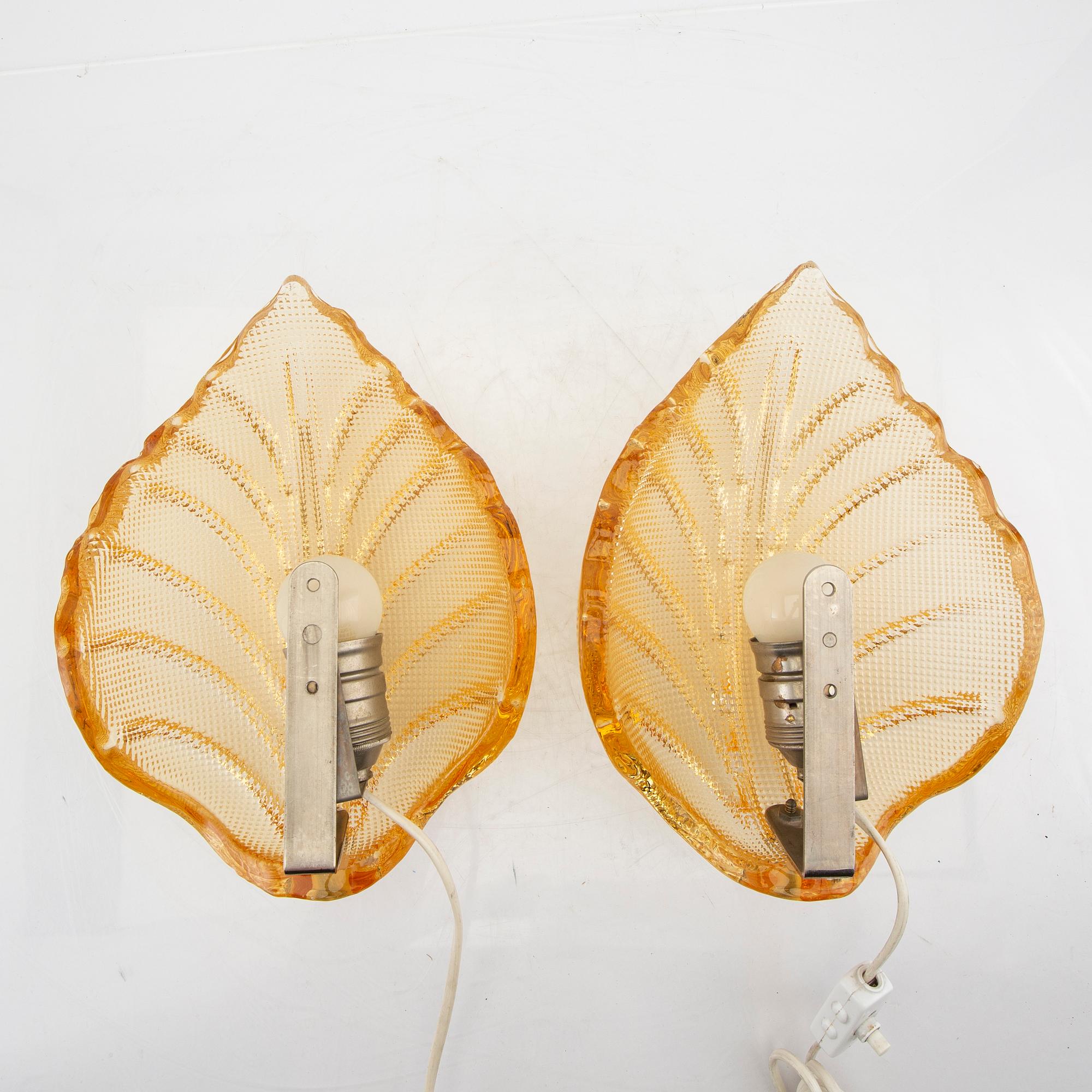 A pair of Possibly Orrefors glass wall scones mid 1900s.