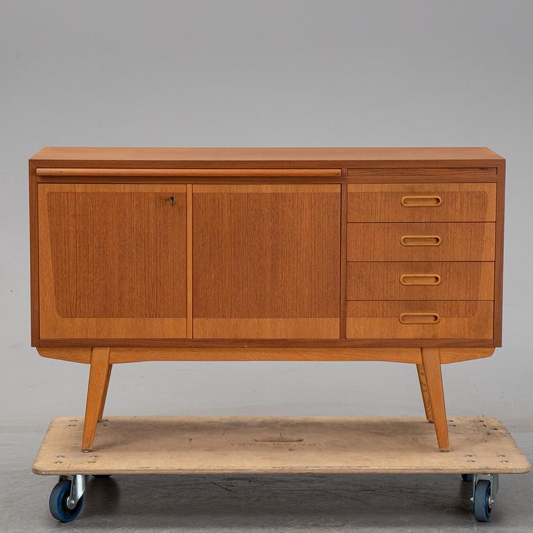A 1950's teak sideboard.