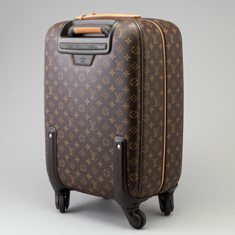 A Monogram Canvas "Zephyr" Suitcase by Louis Vuitton.