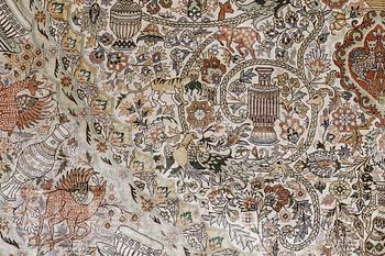 An oval pictoral silk carpet, ca 273 x 180 cm.