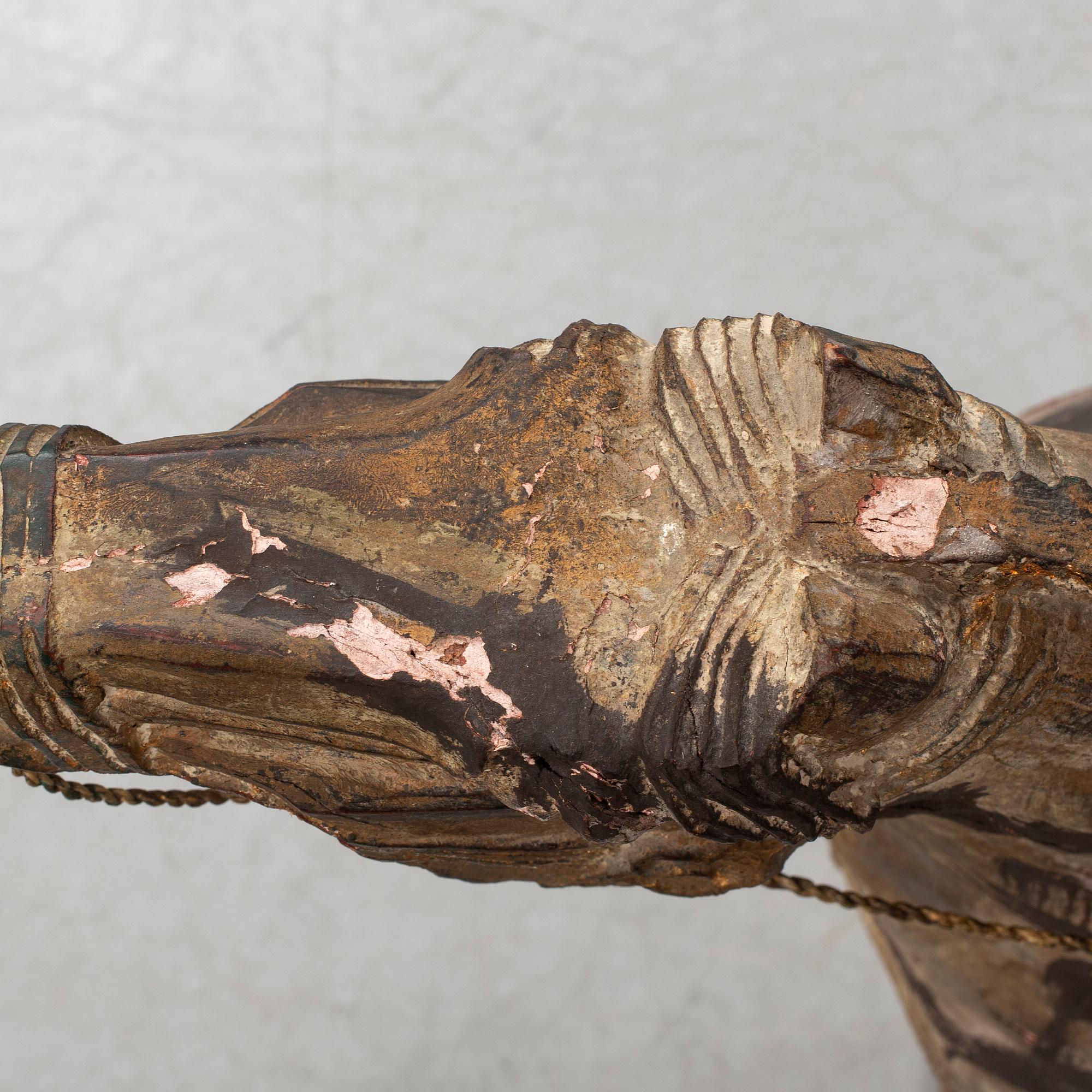 A large modern Chinese wooden sculpture.