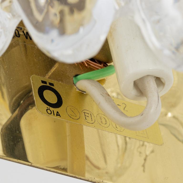 Carl Fagerlund, a pair of brass and glass wall lights, ÖIA, second half of the 20th Century.
