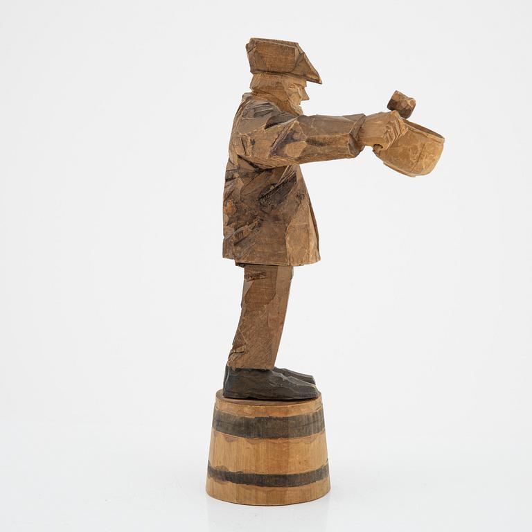 Axel Petersson Döderhultarn, skulptur, signerad. Delvis bemålat trä, höjd 34 cm.