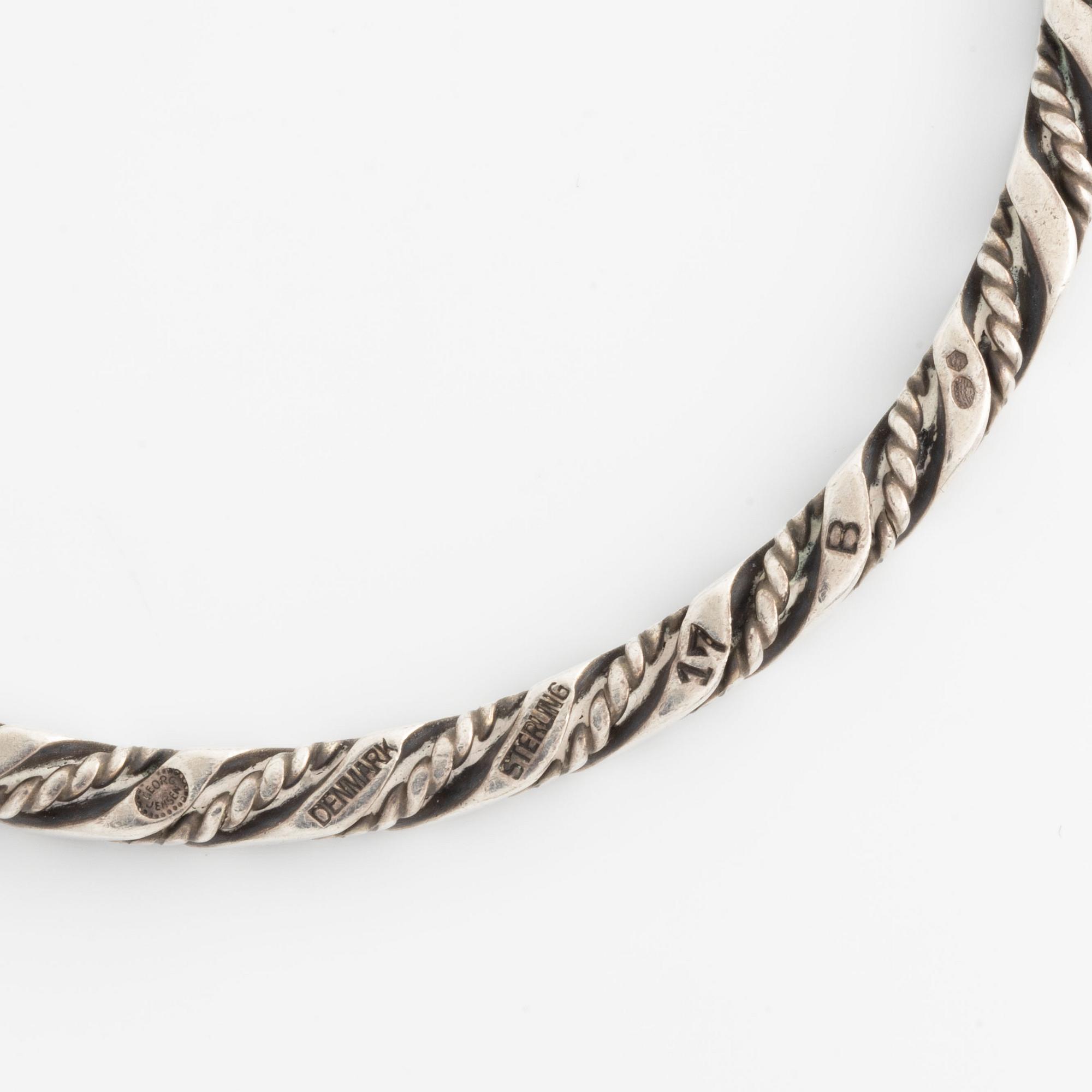 A Georg Jensen bangle in sterling silver.