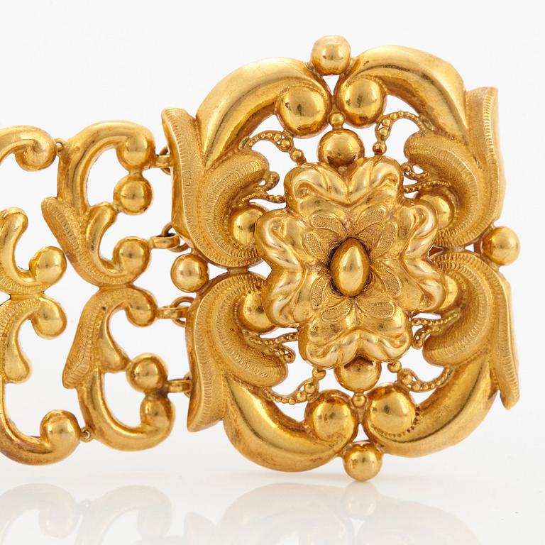 A pair of 19th century 18K gold bracelets.