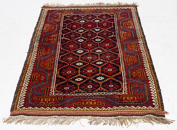 An antique Baluch rug, east Persian, ca 203 x 101 cm.