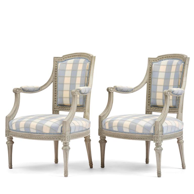A pair of late Gustavian open armchairs by J. E. Höglander (master in Stockholm 1777-1813).