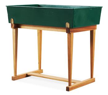 368. A Josef Frank green lacquered jardiniere on a walnut stand, Svenskt Tenn, Sweden 1960's.