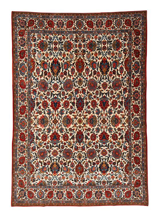 A carpet, semi-antique, ca 314,5 x 218 cm.