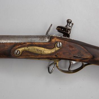 A flintlock shotgun, circa 1800.