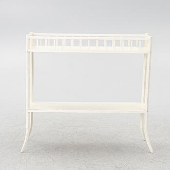 A plant stand, circa 1900.