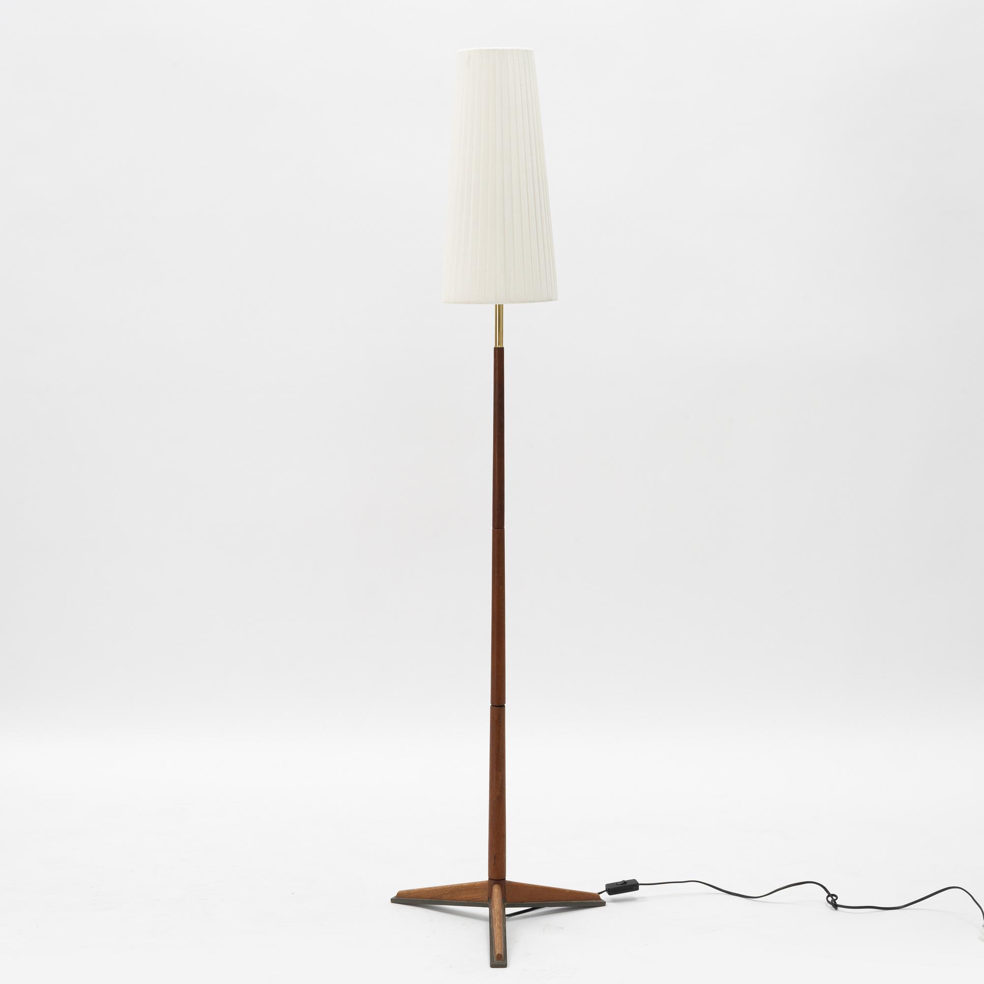 A 1960s teak floor lamp.