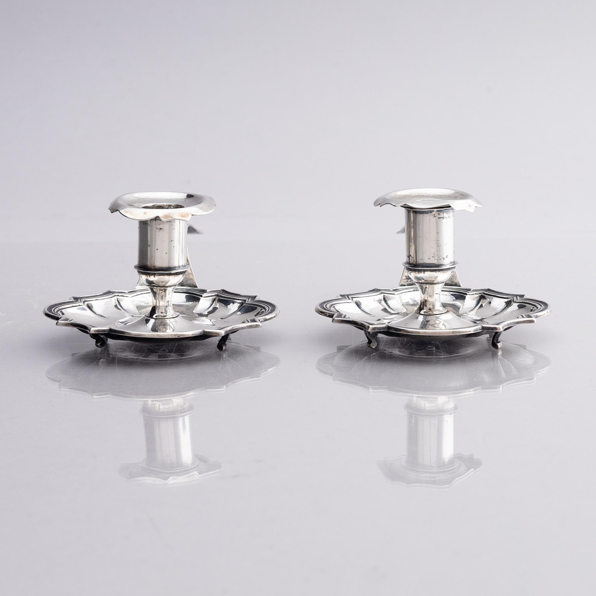 A pair of Swedish 18th century silver chamber-candlesticks, marks of Jürgen Friedrich Sickman, Stockholm 1757.