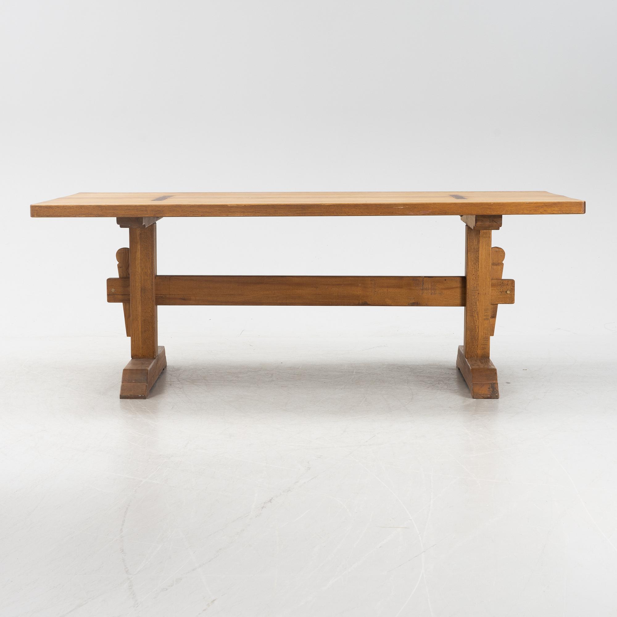 An oak trestle table.