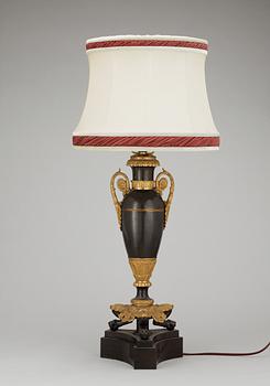 256. A Frensh late Empire table lamp. 19th Century.