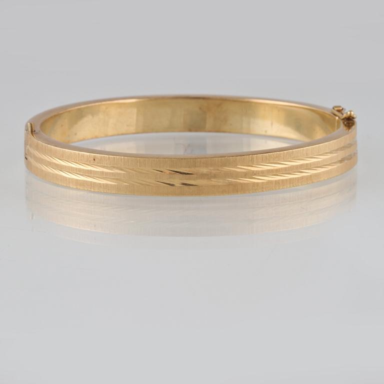 ARMRING, 14K guld, utländska stämplar. Vikt 26,2 gram.