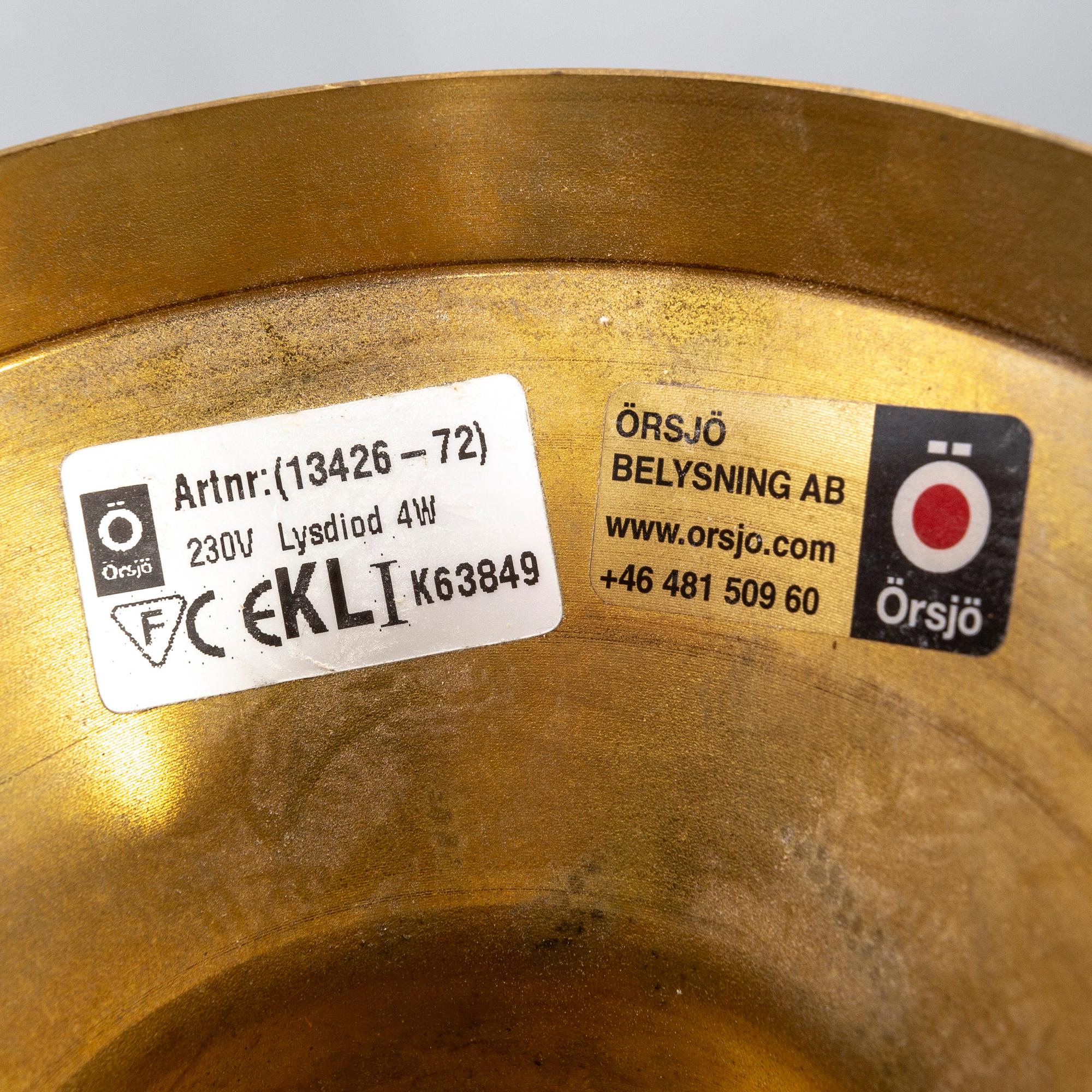 A contemporary 'Hobo' brass and glass pendant lamp by Gustaf Nordenskiöld for Örsjö.