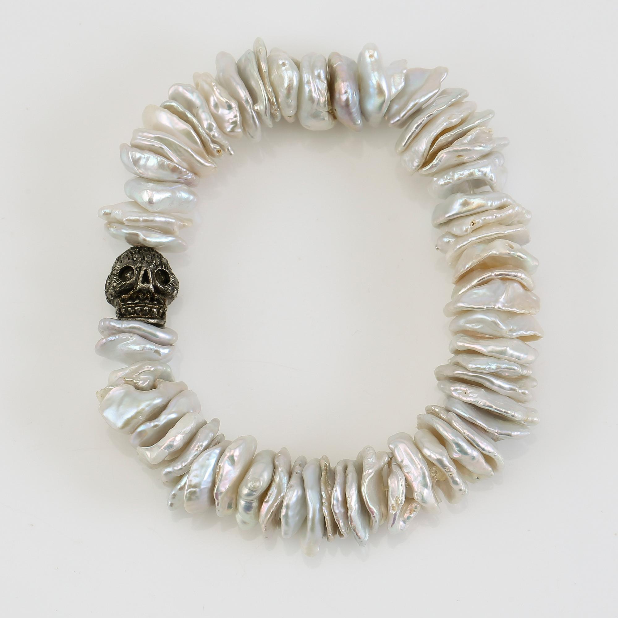 ARMBAND, sötvattenspärlor, silver och diamanter.