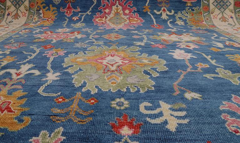 A carpet, Ushak Design, ca 303 x 246 cm.