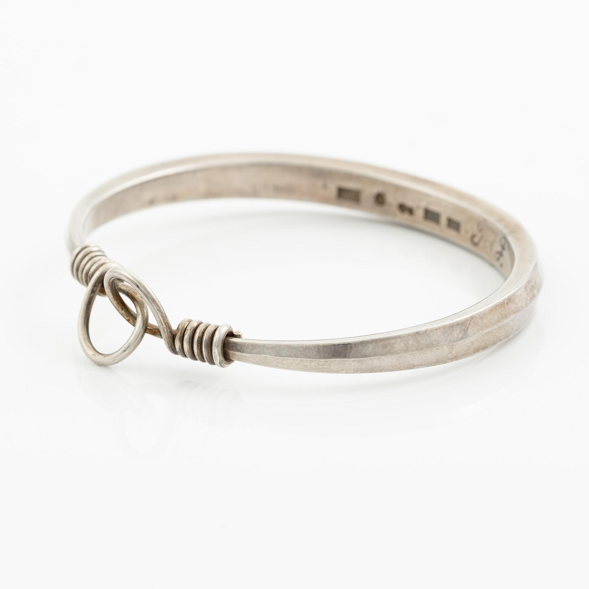 A bracelet and two pairs of earrings, silver, including E Ohlsson, Stockholm 1977.