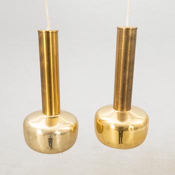 Wilhelm Lauritzen, taklampor ett par "Guldpendel" för Louis Poulsen Danmark 1900-talets mitt/andra hälft.