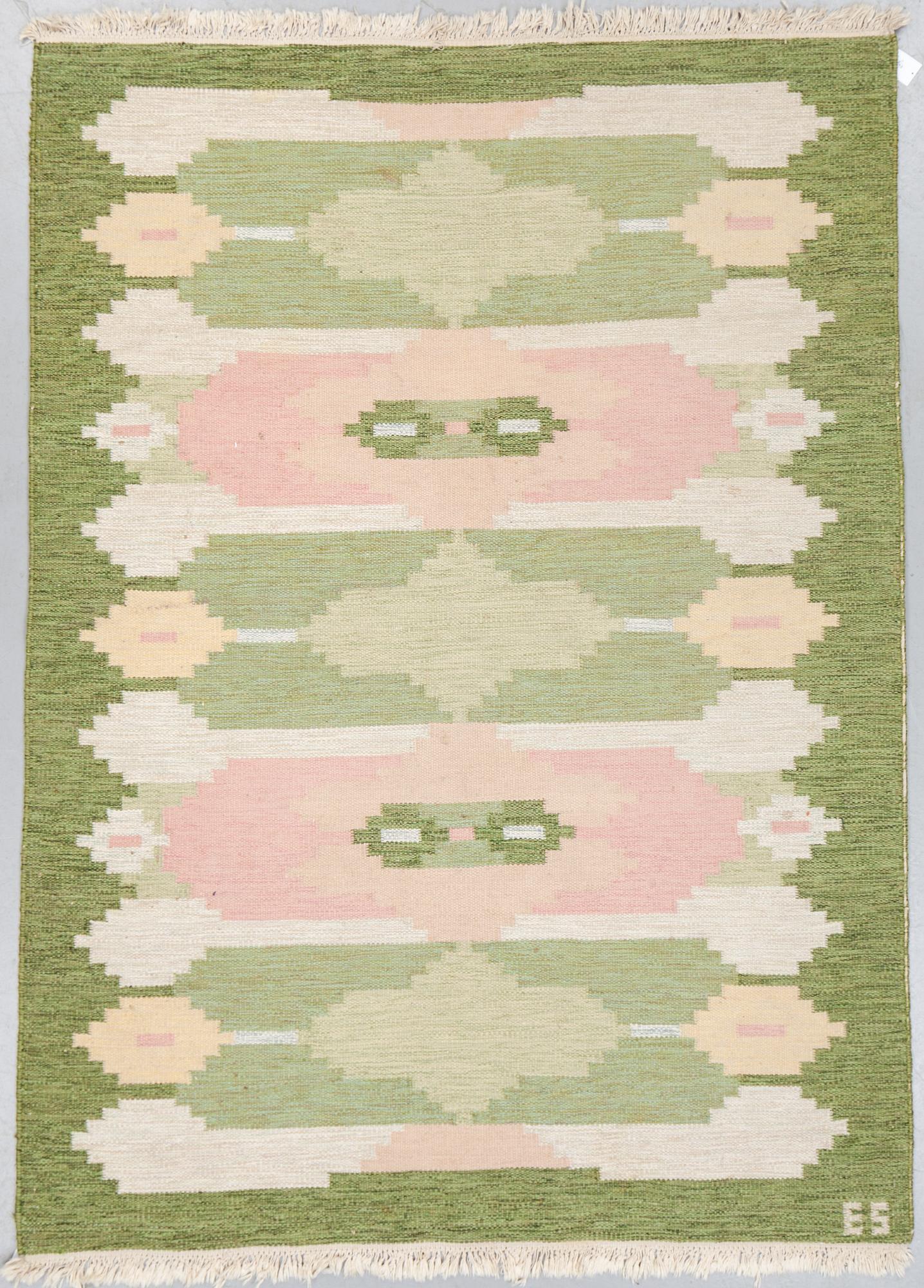 A carpet, flat weave, ca 241,5 x 172,5-175,5 cm, signed ES.