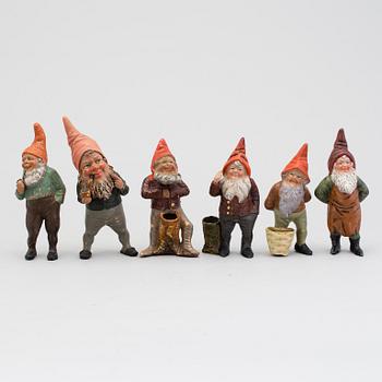 A lot of six painted terracotta santa claus figurines first half of the 20th century.