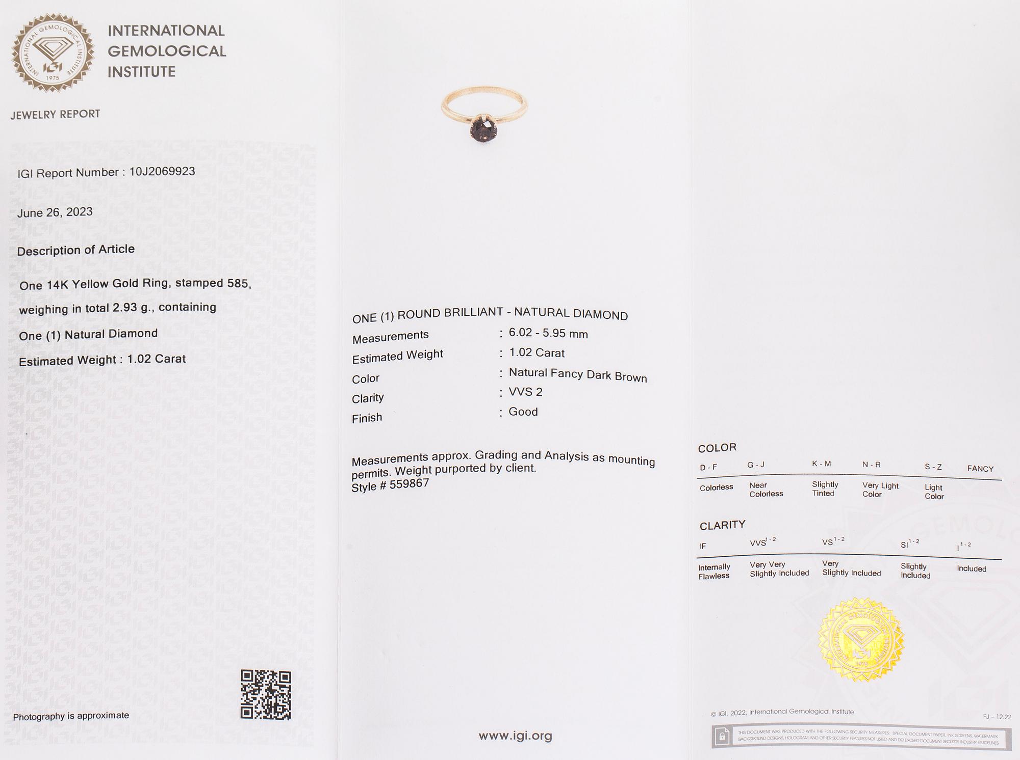 A 14K gold ring set with a brilliant-cut brown diamond. With IGI-report.