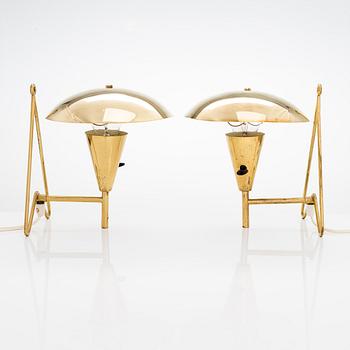 Two mid-20th-century wall lights / table lamps, model EV 57 for Itsu, Finland.