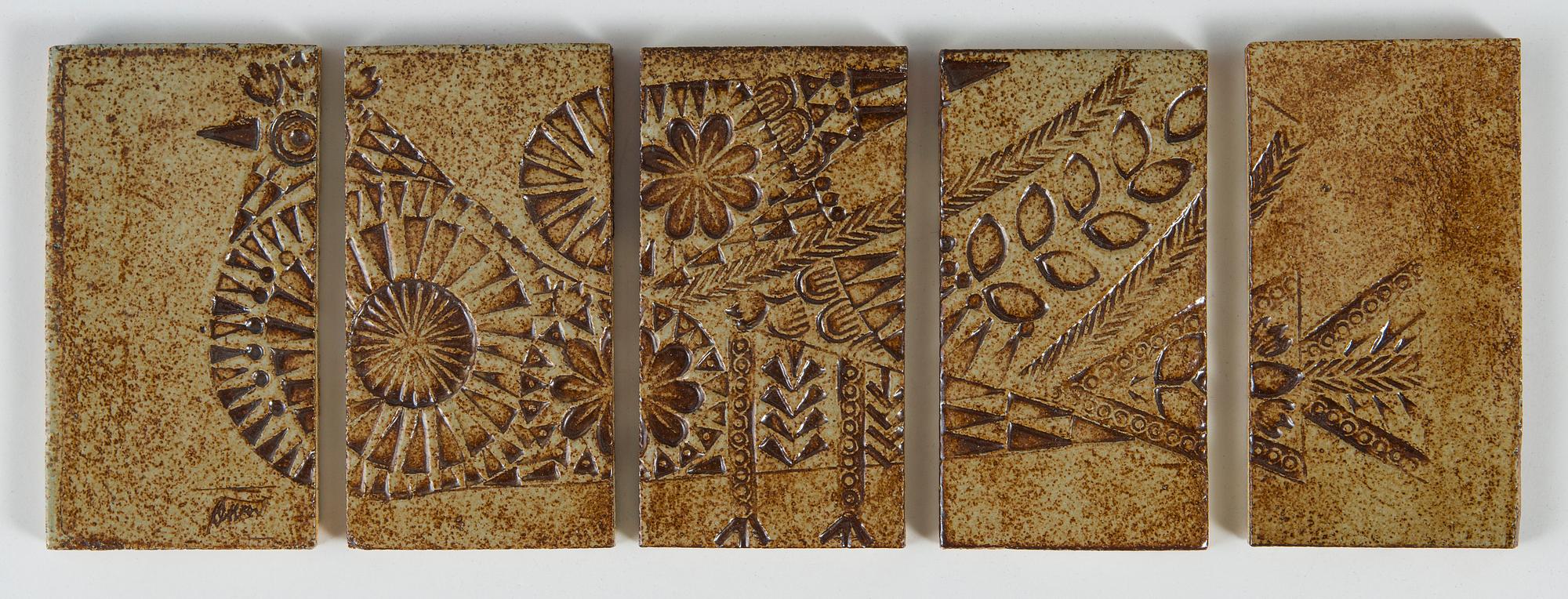 Roger Capron, a five-piece ceramic relief, signed.