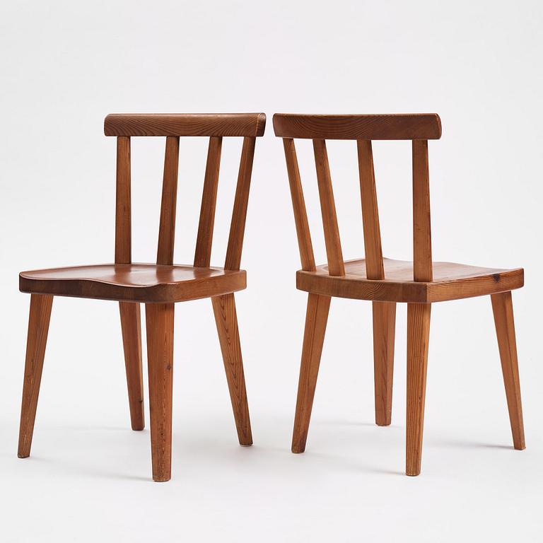 Axel Einar Hjorth, a set of four stained pine "Utö" chairs, Nordiska Kompaniet, Sweden, 1930s.