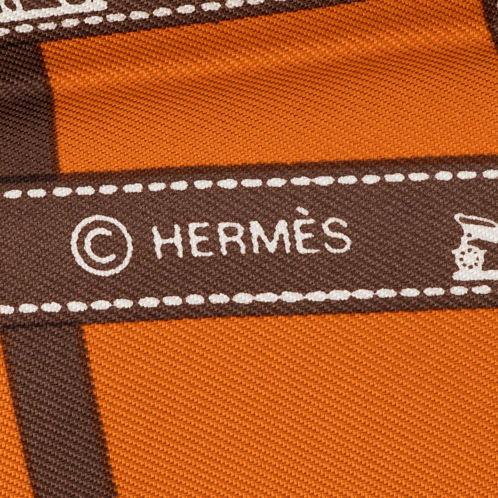 Hermès, a 'Jumbo' leather bracelet and a silk scarf.