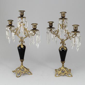 A pair of Victorian brass candelabra from around year 1900.
