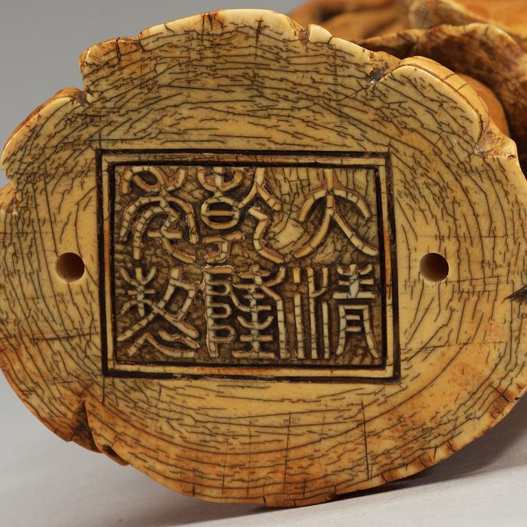 A carved ivory figure of one of the immortals, China presumably early 20th century.
