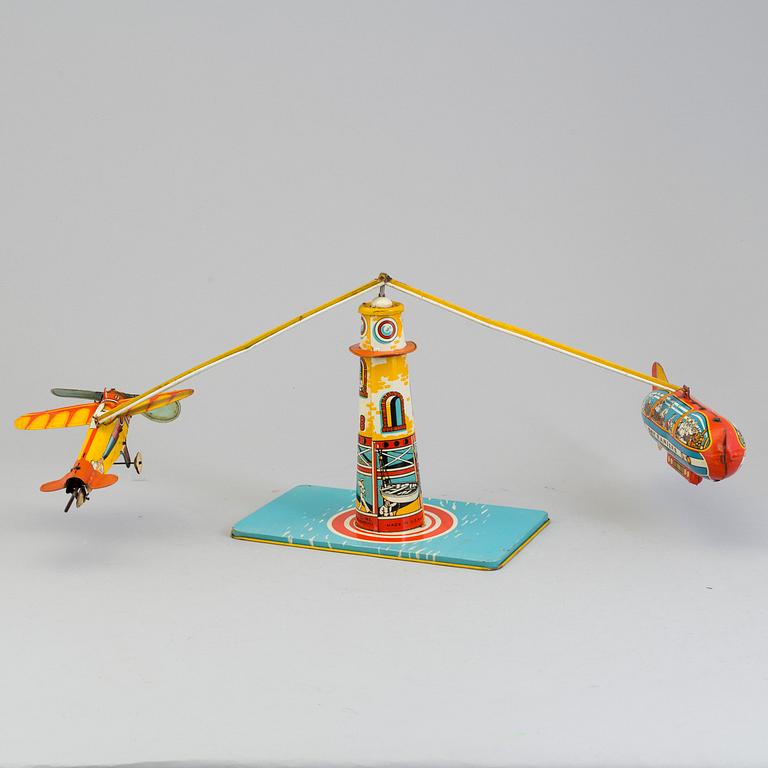 1940'S UNIQUE ART MFG. "SKY RANGERS PLANE & ZEPPELIN " TIN WIND-UP TOY.