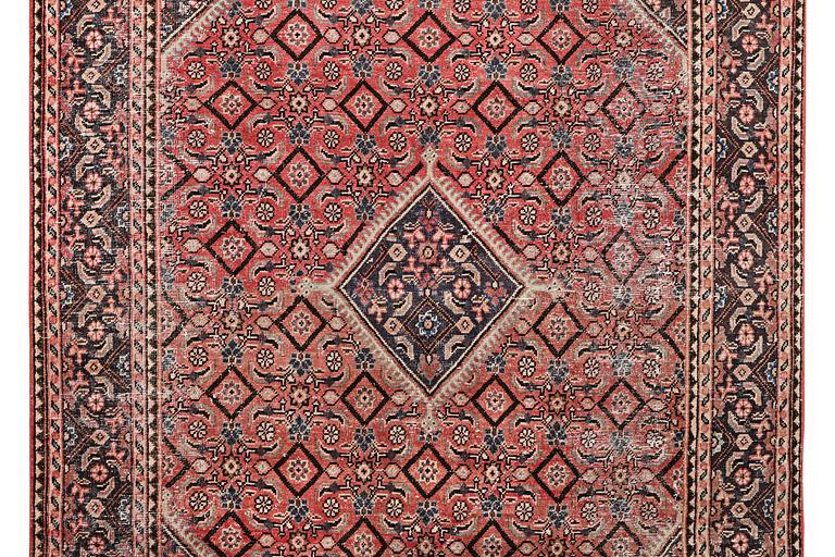 A Persian carpet, vintage design, c. 286 x 208 cm.