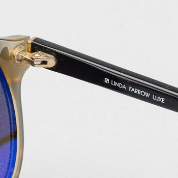 Sunglasses by LINDA FARROW LUXE.