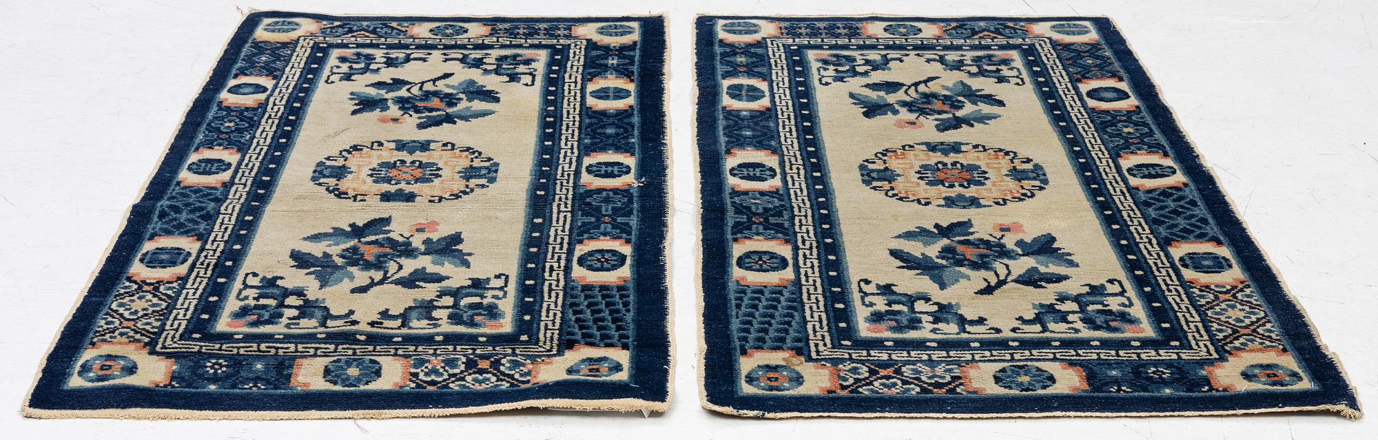 A pair of Baotou rugs, China, c. 120 x 64 cm.