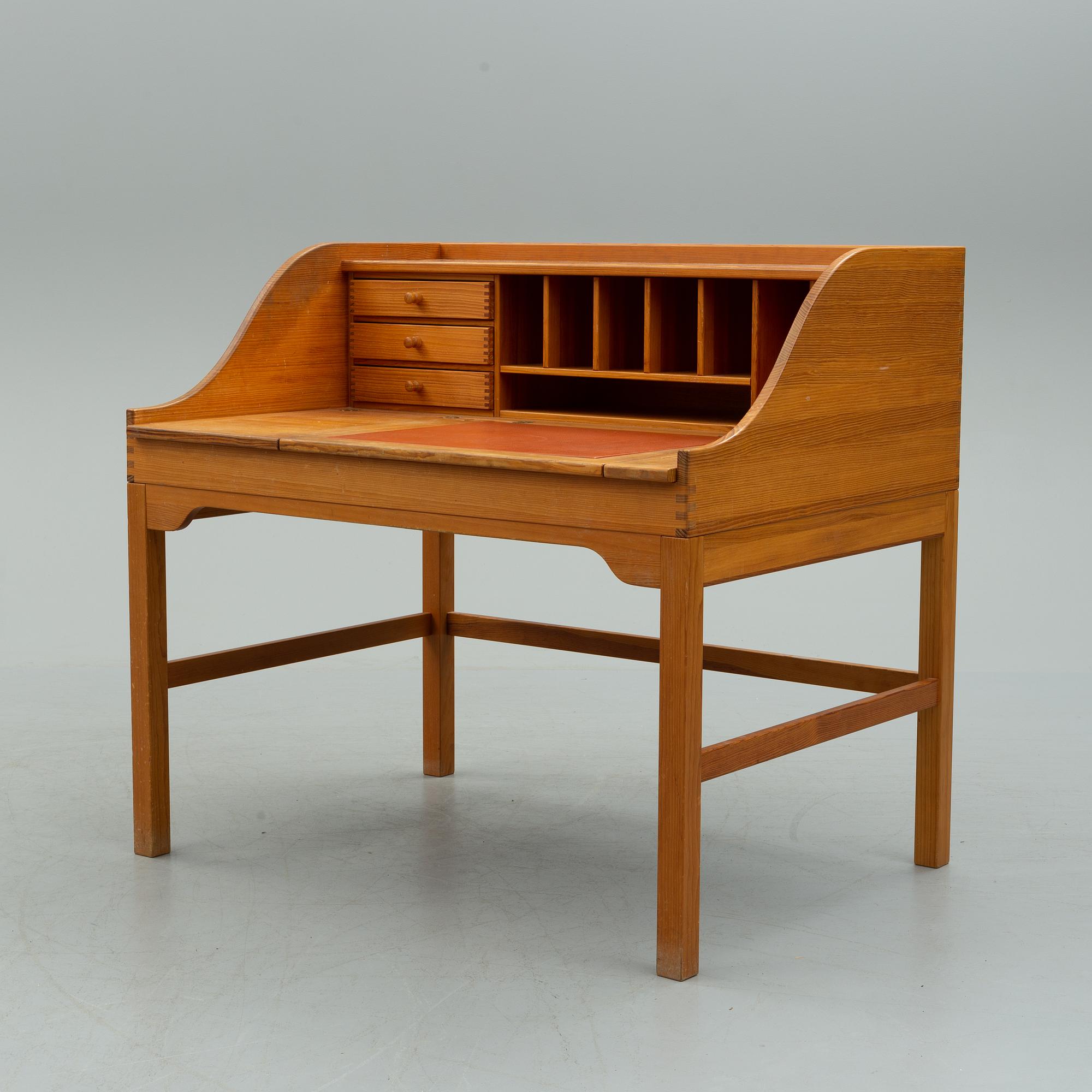A mid 20th century writing desk by Andreas Hansen for Hadsten Träindustri, Denmark.