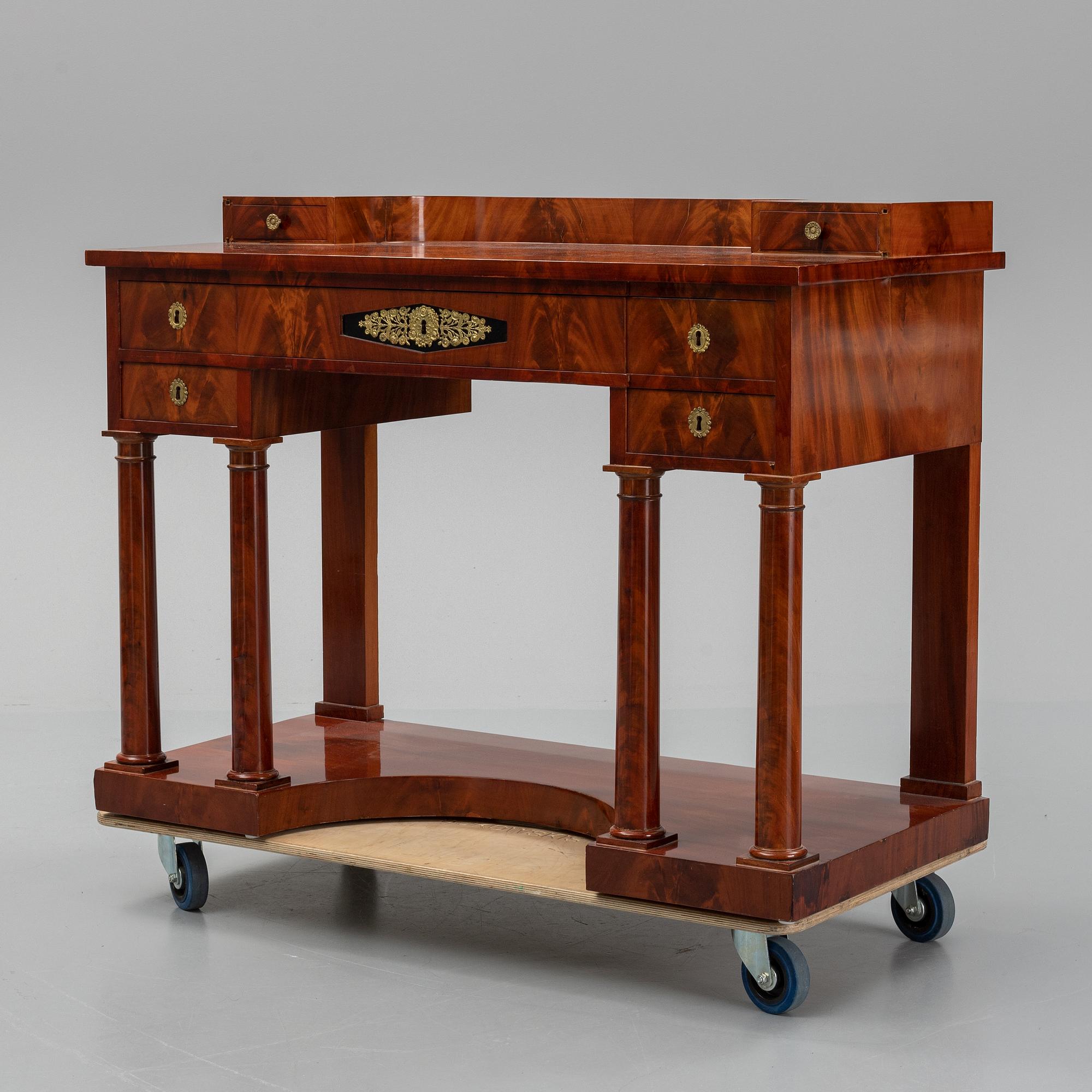 A mahogany console table, Stockholm, first half of the 19th century .