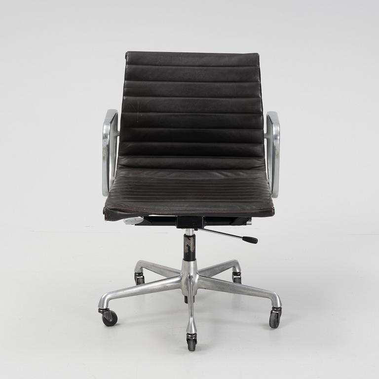 An EA 118 swivel office chair by  Charles and Ray Eames for Herman Miller, designed 1958.
