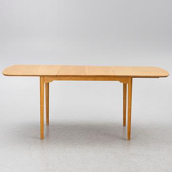 A dining table with six chairs, Sweden, 1940's.