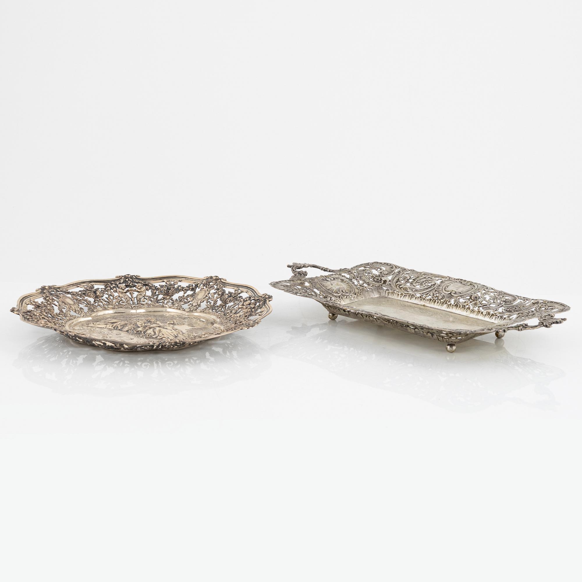 Two silver platters, presumably Wilhelm Weinranck, Hanau, and mock marks, Hanau, Germany, late 19th century.