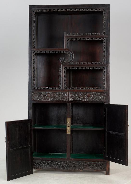 A Chinese hardwood cabinet, early 20th Century.