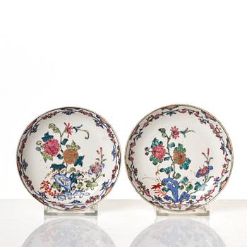 A pair of famille rose cups with stands, Qing dynasty, Qianlong (1736-95).