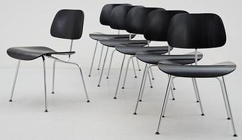 A set of six Charles & Ray Eames 'DCM' chairs by Vitra.