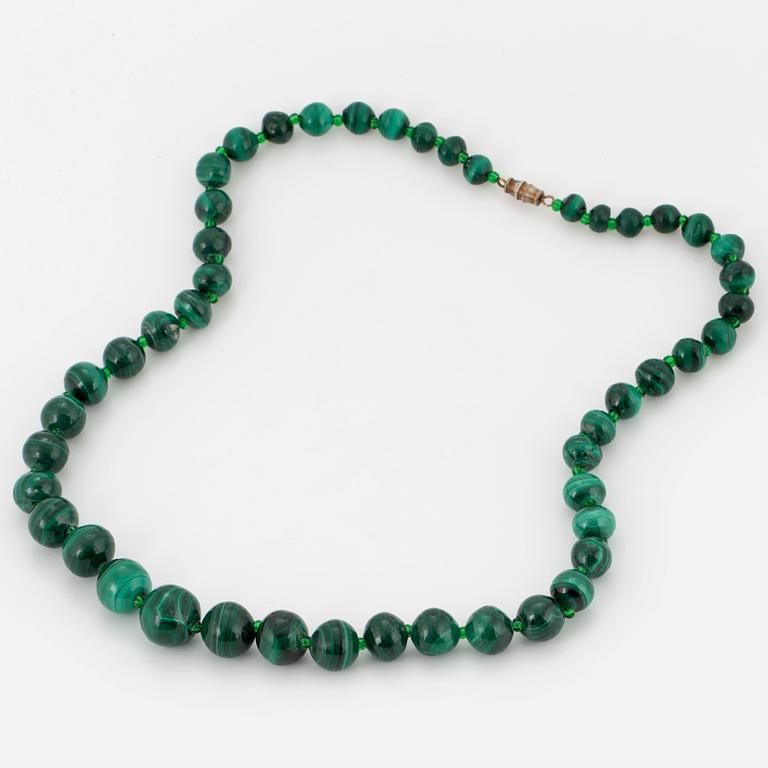 A malachite bead necklace.