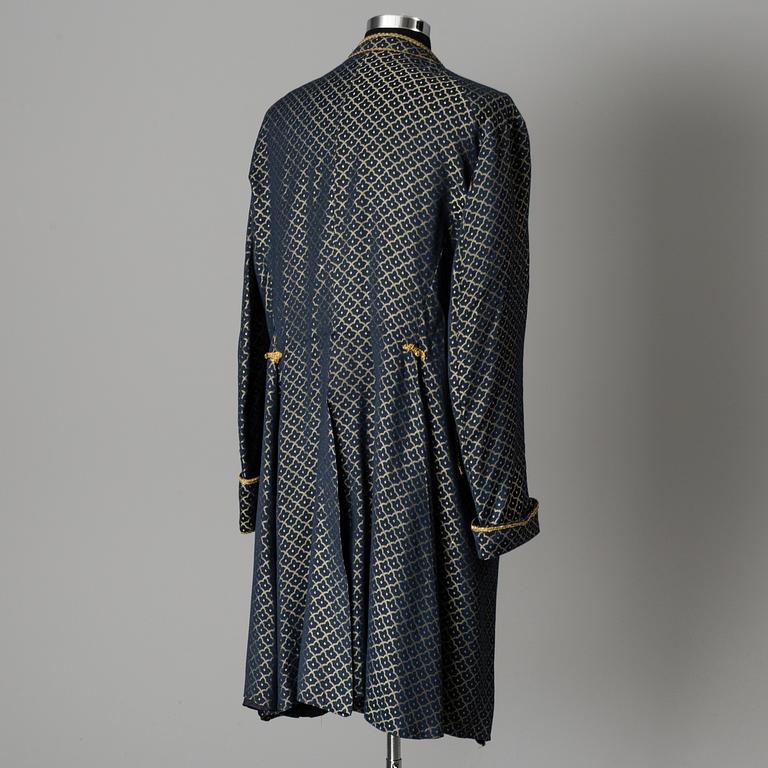 two theater coats from the late 20th century.