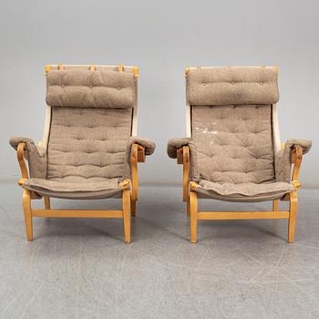 BRUNO MATHSSON, a pair of 'Pernilla' easy chairs, from Dux.